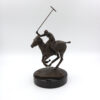 Patinated Bronze Model Of A Polo Player On Horseback, American 20th Century.