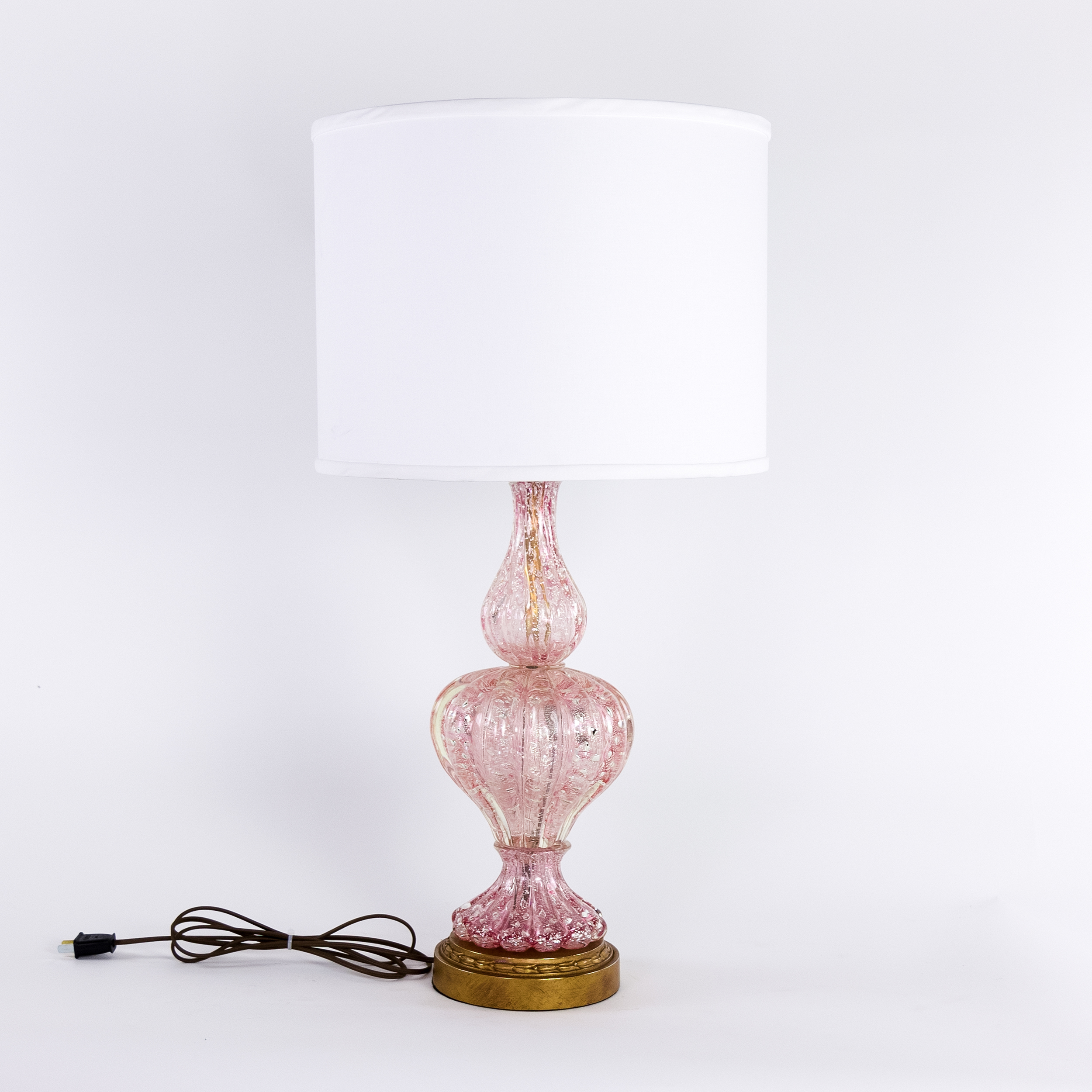 pink and silver table lamp