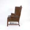 Dark Muddy Green Leather Wing Chair in the Georgian Style, English Circa 1890.