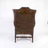 Dark Muddy Green Leather Wing Chair in the Georgian Style, English Circa 1890.