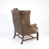 Dark Muddy Green Leather Wing Chair in the Georgian Style, English Circa 1890.