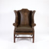 Dark Muddy Green Leather Wing Chair in the Georgian Style, English Circa 1890.