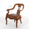 A Sculptural Carved, Open Arm, Lyre Back Armchair, English Circa 1850.