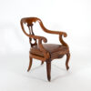 A Sculptural Carved, Open Arm, Lyre Back Armchair, English Circa 1850.