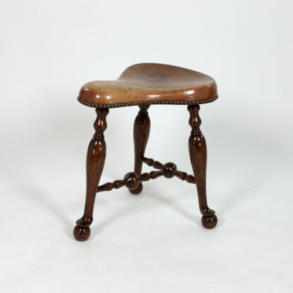 Turned Mahogany Three-Legged Saddle-Seat Stool, Leather Seat with Nailhead Trim English circa 1850