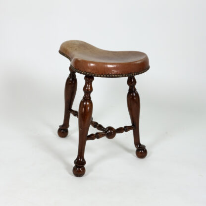 Turned Mahogany Three-Legged Saddle-Seat Stool, Leather Seat with Nailhead Trim English circa 1850