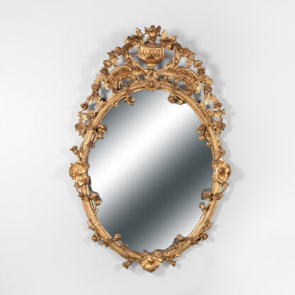 Carved French Giltwood Oval Mirror with Urn Crest and Floral Garlands, Circa 1870