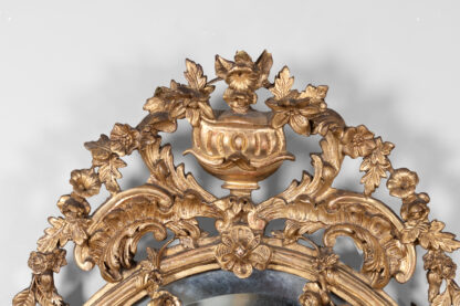 Carved French Giltwood Oval Mirror with Urn Crest and Floral Garlands, Circa 1870